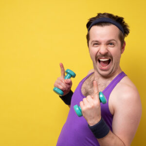 Funny,Sportsman,Which,Doing,Exercise,With,Lightweight,Dumbbells,And,Looking